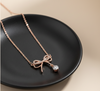 Sparkling Rose Gold Bow Necklace