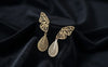 Gold Butterfly wing motif with teardrop